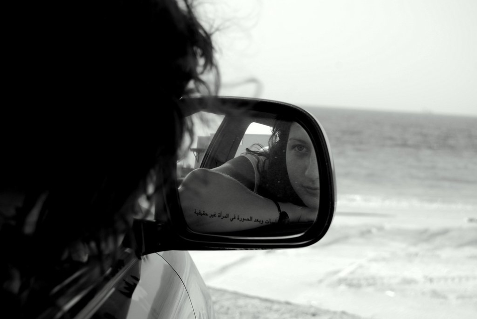 Girl Looking in Rearview Mirror - Teen Rehab