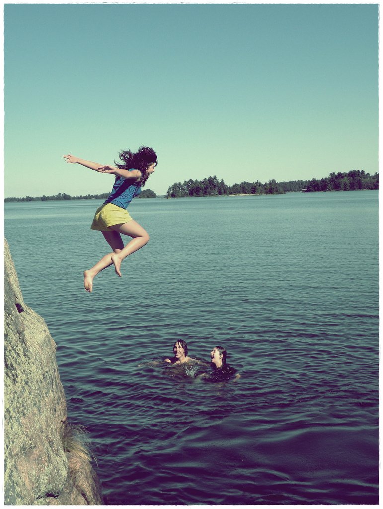 Teenage Girl Jumping Into Lake - Teen Rehab