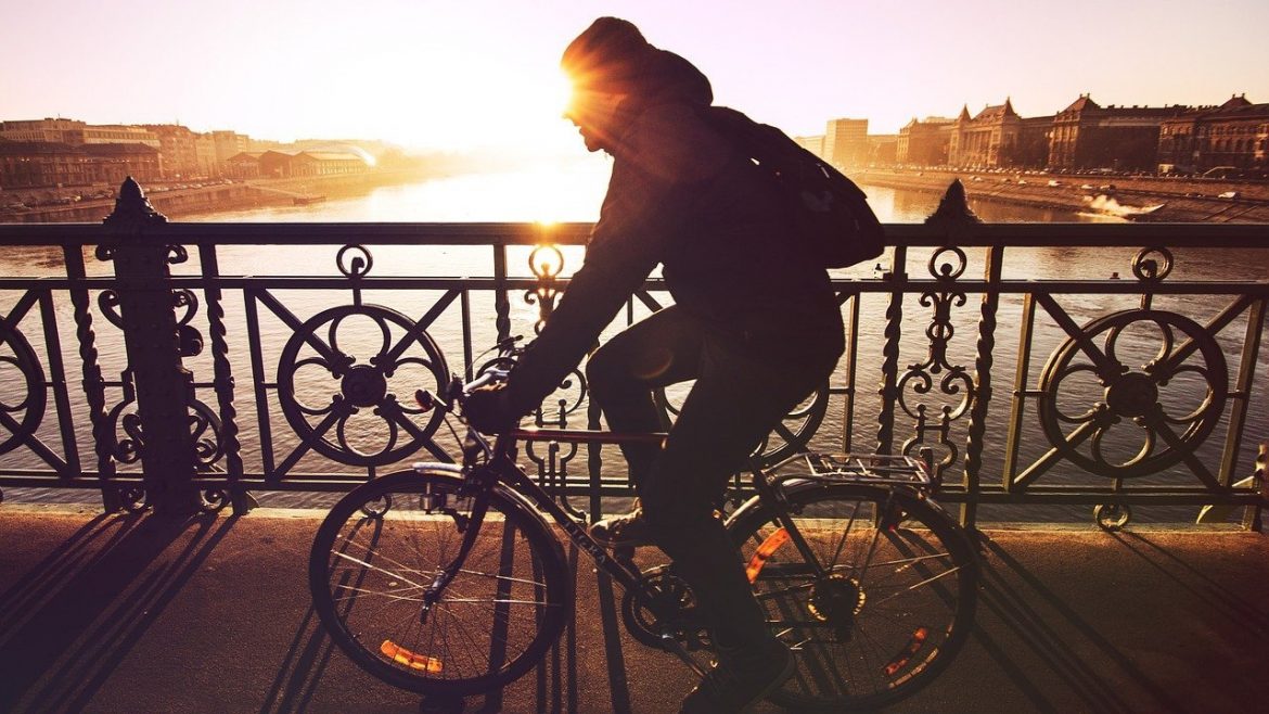 Boy Riding Bike Sunset - Teen Rehab