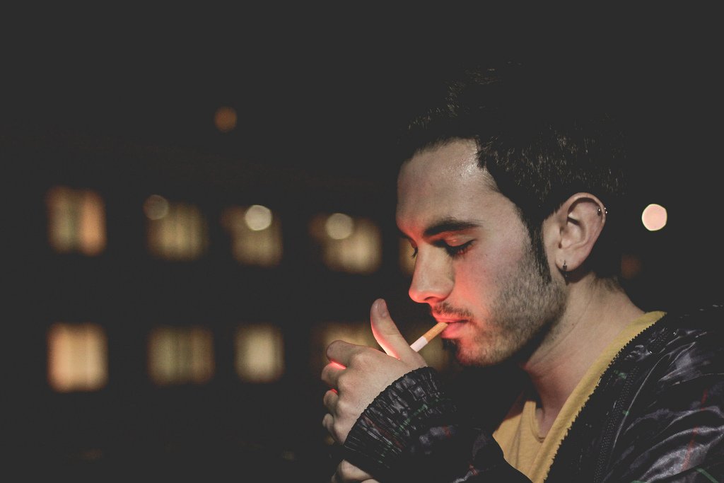 Guy Lighting Cigarette - Teen Rehab