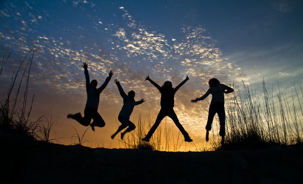 Four Teenagers Jumping Sunset Silhuettes - Teen Rehab