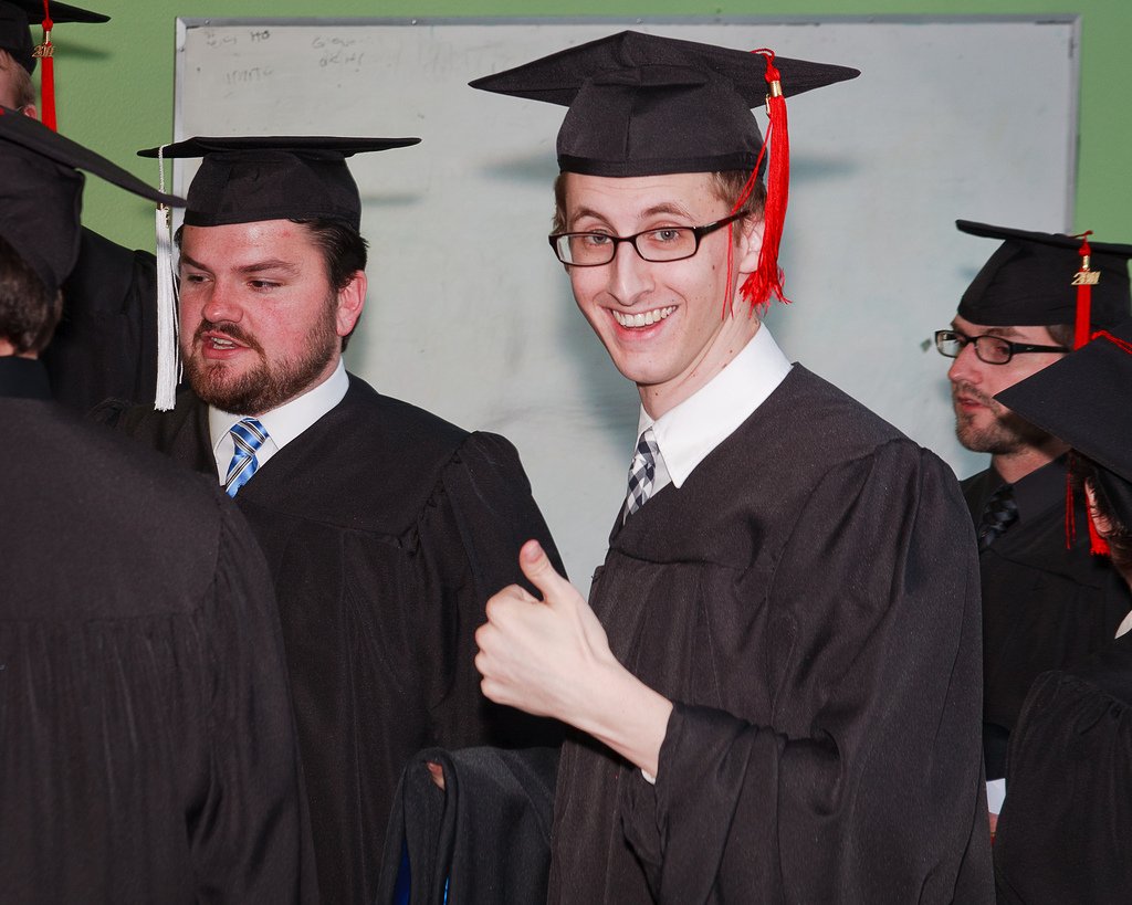 Teenage Boy Thumbs Up Graduation - Teen Rehab