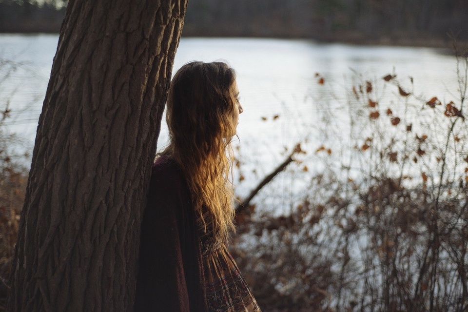 Teenage Girl Looking Out Over River - Teen Rehab