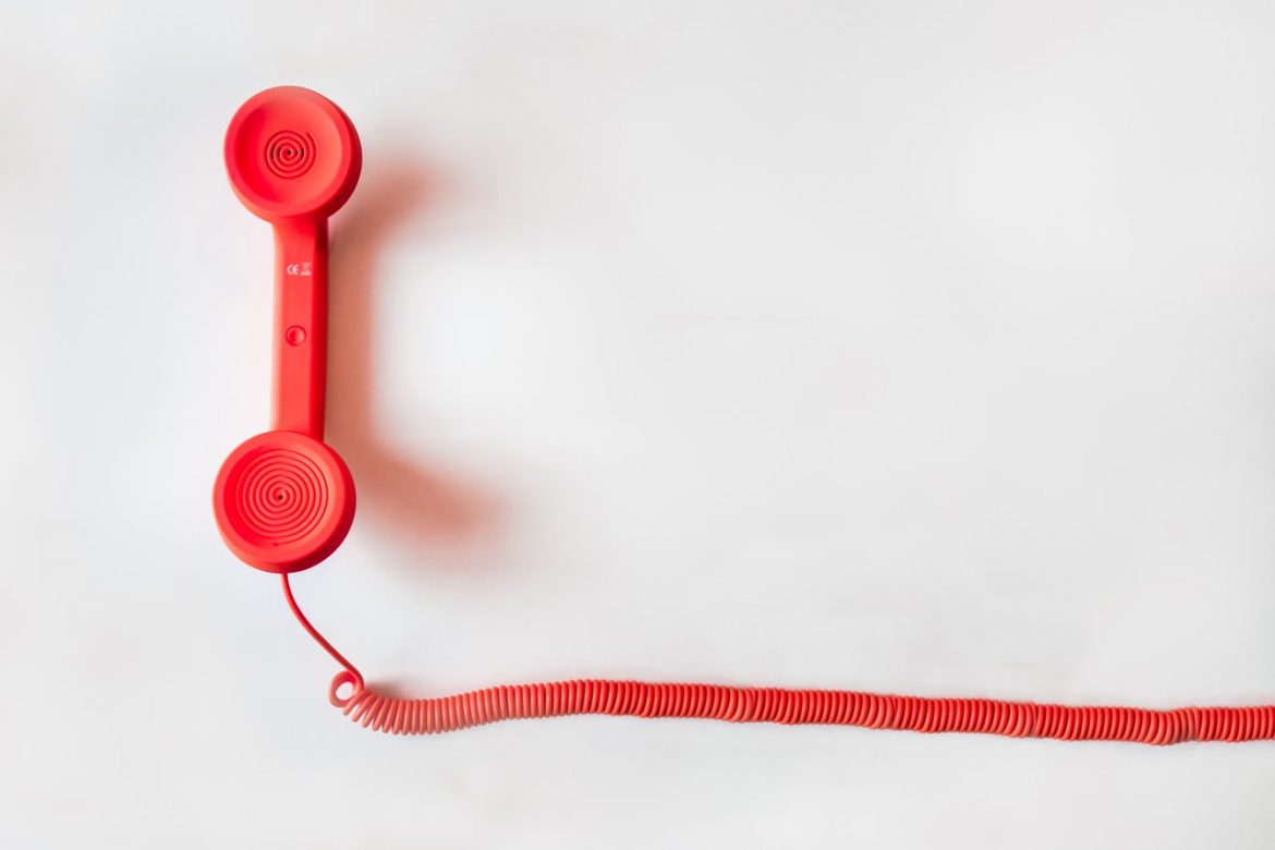white background red telephone phone landline call