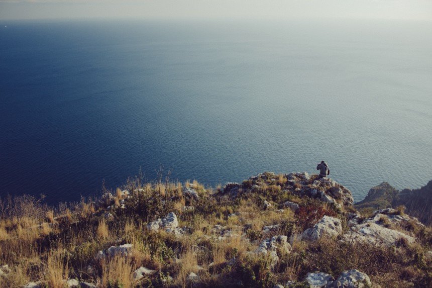 Man alone on cliffs