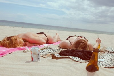 teens girls alcohol drinking beach