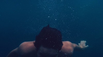 boy teen underwater swim